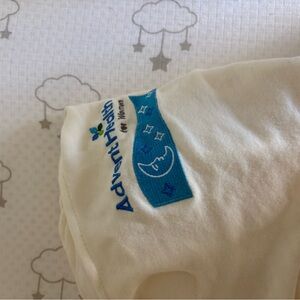 Halo Cream Swaddle with Blue Logo